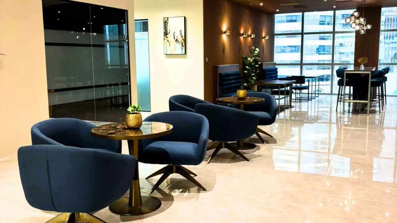 office waiting area with modern seating and elegant interior at Workstudio Singapore
